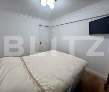 Apartament cu 3 camere, 55 mp, centrala si AC, zona Ultracentral - Fotografie 2