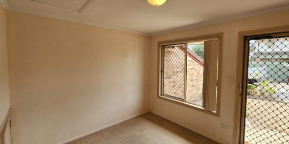 This comfortable 2-bedroom townhouse is in a perfect location - Photo 3