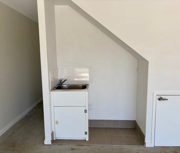 Trendy Townhouse Designed With A New York Warehouse Feel - Photo 3