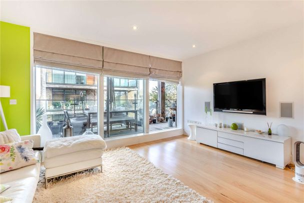 A spacious two bedroom modern apartment with parking - Photo 1