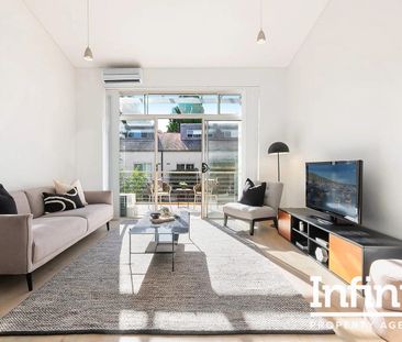 LOFT STYLE, SPLIT LEVEL TWO-BEDROOM APARTMENT AVAILABLE FOR RENT! - Photo 1