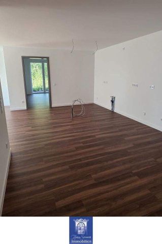 Stilvolles Wohnen im Neubau! Ruhig und grün, Terrasse, 2 Bäder, Fußbodenheizung! - Photo 3