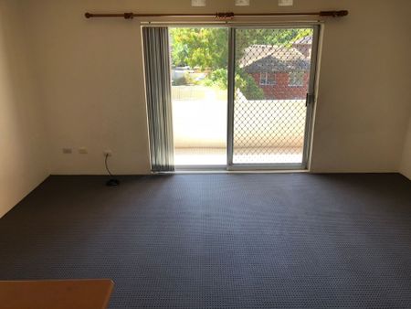 Two Bedroom Unit with Garage - Photo 2