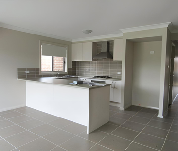 LOW MAINTENANCE LIVING - Photo 2