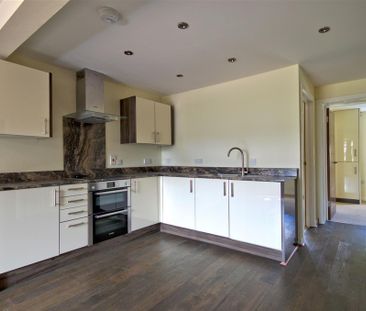 A stylish, high specification apartment with allocated parking a co... - Photo 4