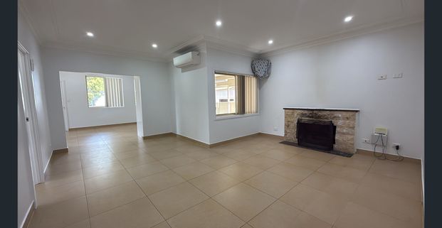 Spacious 4-Bedroom Home with Separate Retreat - Photo 1