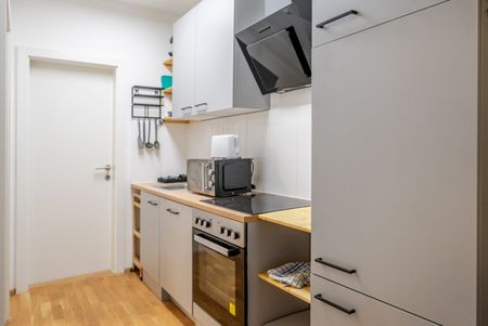 Einziehen & wohlfühlen: Voll möblierte 2-Zimmer-Wohnung mit Balkon, Klima & Garage - Foto 5