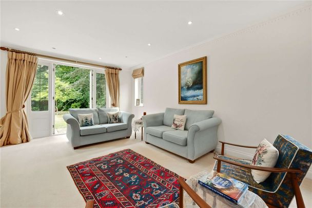 A well presented six bedroom detached family home situated in a Private Estate just 0.3 of a mile from Cobham High Street. - Photo 1