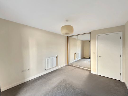 A well-presented ground floor apartment featuring a west-facing balcony, ideally situated away from traffic within easy reach of Addenbrooke’s Hospital. - Photo 1