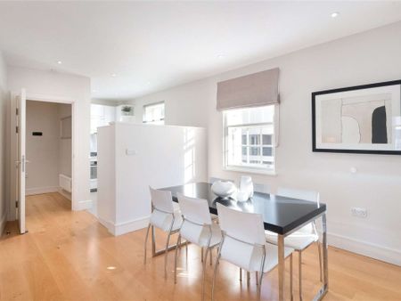 A luxuriously appointed two bedroom apartment in this converted period building in Belgravia benefitting from wood flooring. - Photo 5