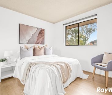 Renovated top-floor unit positioned at the rear of the complex, wal... - Photo 5