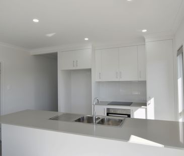 :: FRESHLY BUILT HOME IN SOUGHT - AFTER LOCATION - Photo 2