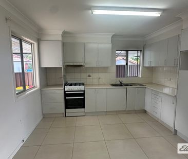 Spacious Family Home with Large Backyard - Photo 4