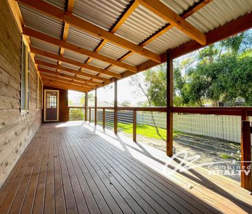 Four Bedrooms on Large Block - Photo 1