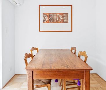 Bright and Spacious Townhouse with Private Courtyard & Double Garage - Photo 3