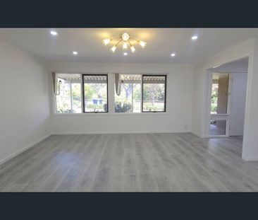 Newly Renovated 5 Bedrooms Family Home with Sunroom & Outdoor Enter... - Photo 1