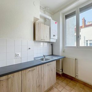 Lyon 6ème : Emplacement privilégié T3 en étage élevé avec cuisine aménagée - Photo 3