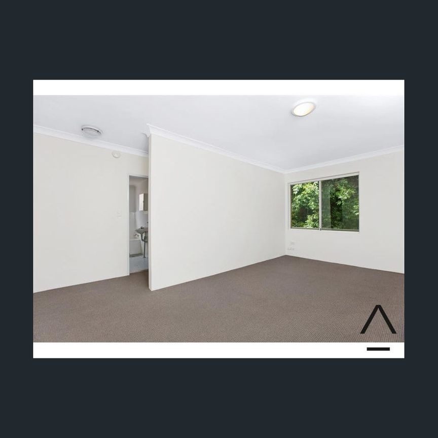 Secure Apartment in Sought After Location - Photo 1