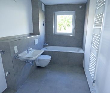 Modern geschnittene 4-Zimmer-Erdgeschoss-Wohnung mit Einbauküche un... - Foto 5