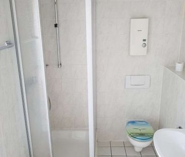 Freundliche Dachgeschosswohnung in zentraler Lage - Photo 1