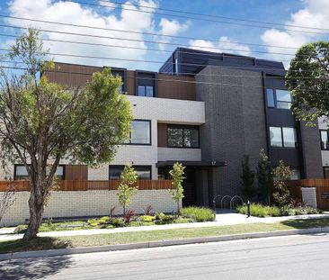 STYLISH DOUBLE-STORY APARTMENT WITH MODERN AMENITIES - Photo 6