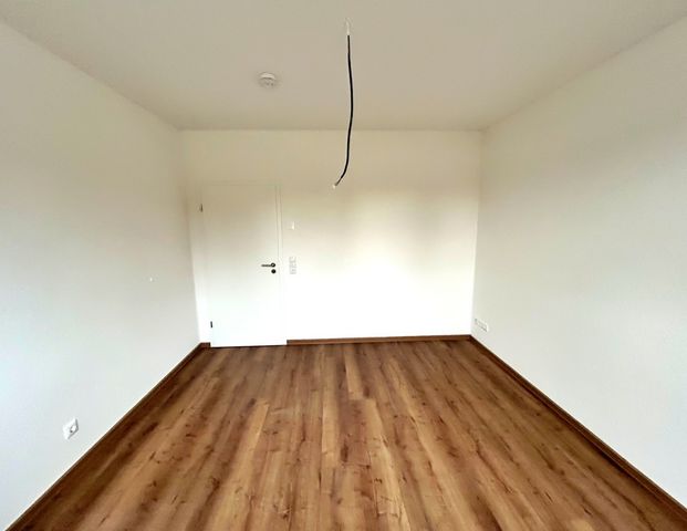 Augustfehn: Große Obergeschosswohnung mit Lift und Einbauküche | 91m² | KfW 40 - Photo 1