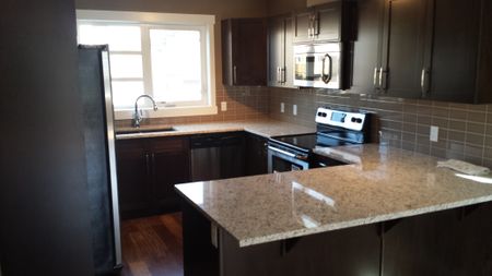 Lowest price ever..Few years old 2 bdrms plus den Townhouse in Coventry! - Photo 4