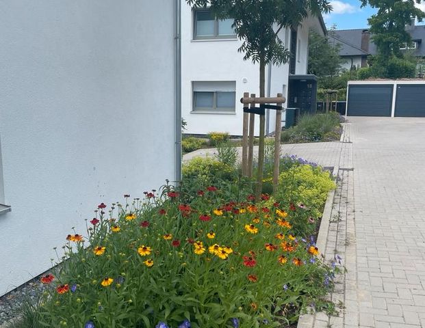 Moderne 2 Zimmerwohnung mit großzügiger Terrasse, Garten, Garage - Foto 1
