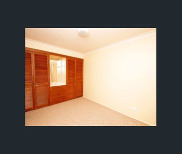 Neat unit located in quiet area - Photo 2