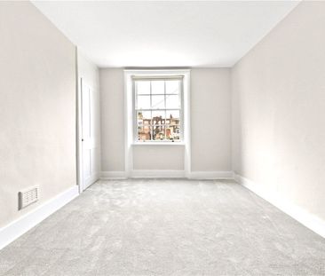 A newly redecorated and recarpeted two bedroom flat situated on the... - Photo 2