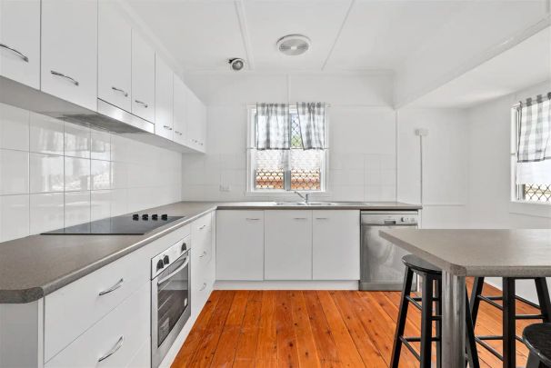 “Freshly Painted Post-War Home Moments from Markets” - Photo 1