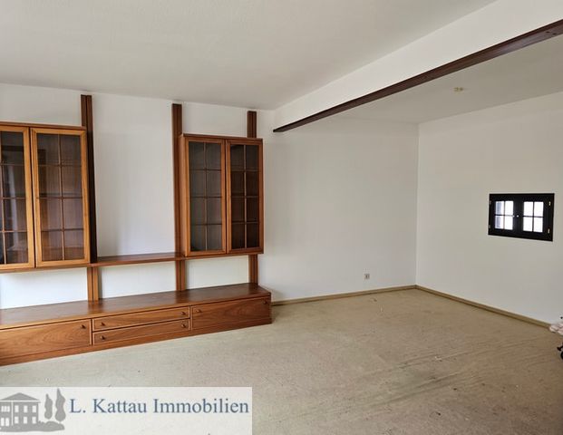 M 08 LESUM -renovierungsbedürftiges Reihenmittelhaus mit einer Garage in ruhiger Lage - Foto 1