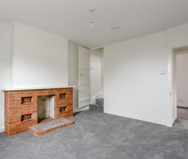 An updated two bedroom semi-detached cottage located in the village... - Photo 1