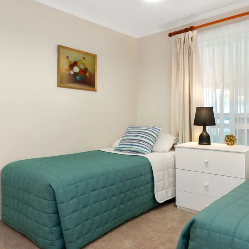 All-Season Family Retreat with Heated Pool & Dual Living – Walk to CHAC, Shops & Transport - Photo 1