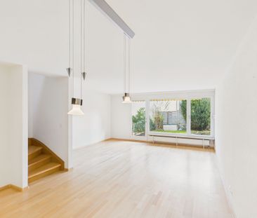 Charming and spacious corner row single-family house in a sought-af... - Photo 2