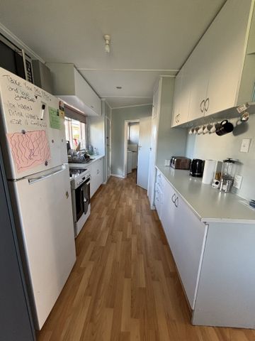 Sunny Family Home with Large Fully Fenced Section - Photo 2