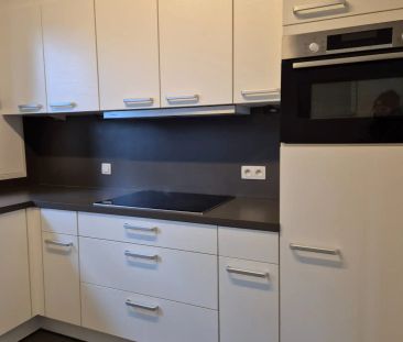 Gelijkvloers appartement met groot terras, tuin en garage. - Photo 4