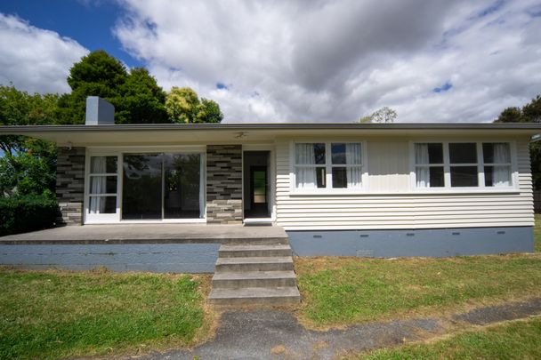 Charming Family Home with Spacious Yard - Photo 1