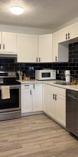LAPRAIRIE, beau 4 1/2 style condo louer pres services transport - Photo 1
