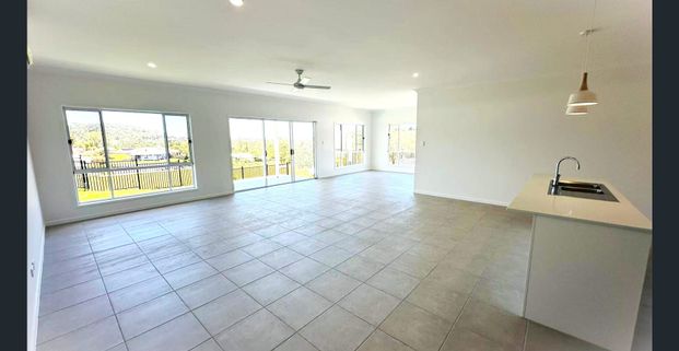 Luxury Brand-New Residence with Four Bedrooms & Multiple Living Zones - Photo 1