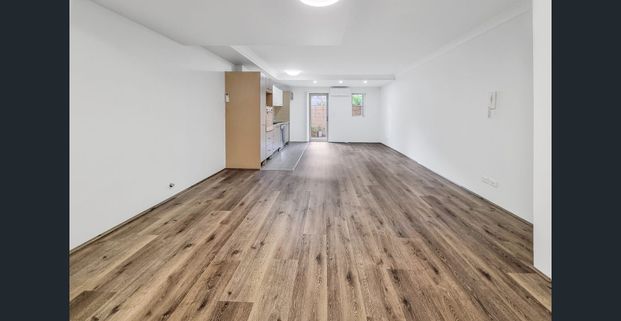 RENOVATED 3 BEDROOM DOUBLE STOREY APARTMENT WITH NEW FLOORING THROUGH-OUT - Photo 1