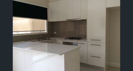 Register to Inspect // Stylish Two-Bedroom Townhouse with Dual Living Spaces - Photo 3