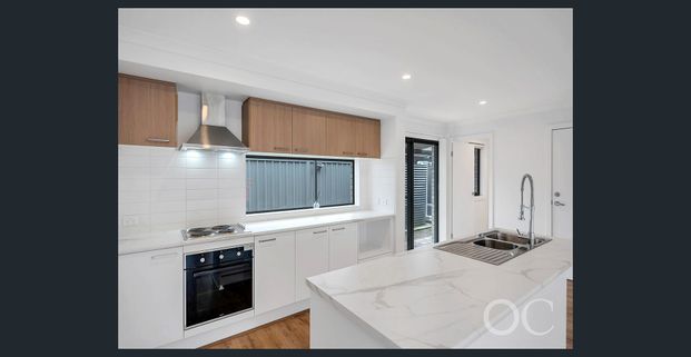 Open the Door to Modern Comfort and Easy Living in Woodville Gardens - Photo 1