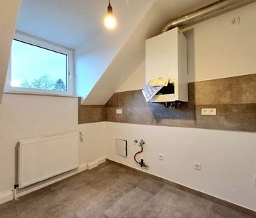 Dachgeschosswohnung in gepflegtem Wohnhaus - Photo 6