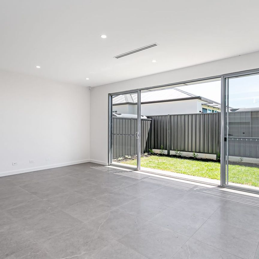 Modern Three bedroom Two Bathroom home in Wanted Locale - Photo 1