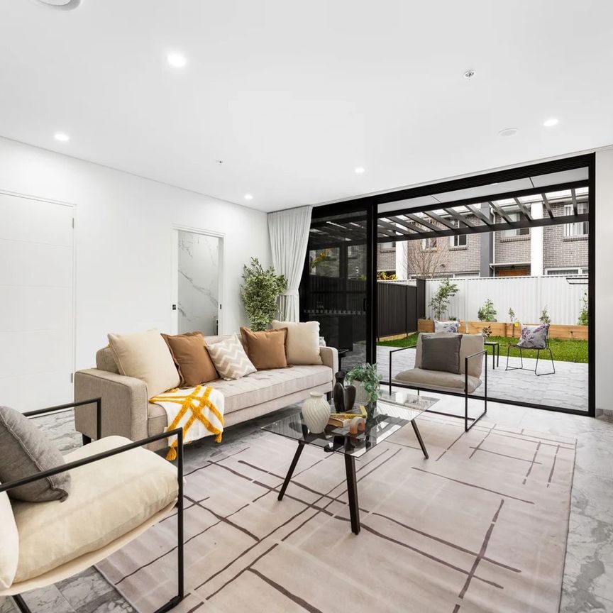 Brand-New Four-Bedroom Townhouse in Prime Location - Photo 1