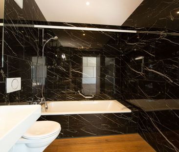 Moderne 2.5-Zimmer-Attikawohnung in grüner Oase - Willkommen in Ihr... - Photo 2