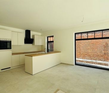 Nieuwbouwappartement op het gelijkvloers met tuin - Photo 5