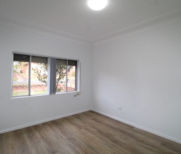 RENOVATED THREE BEDROOM BRICK HOME - Photo 2