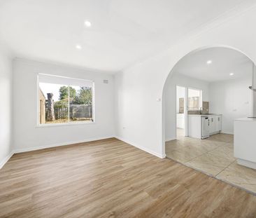 Newly Renovated 4 Bedroom - Photo 6